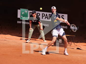 2022-05-17 - Manuel Guinard (FRA) in action against Hugo Gaston (FRA) during the round of 16 at the Open Parc Auvergne-Rhone-Alpes Lyon 2022, ATP 250 Tennis tournament on May 17, 2022 at Parc de la Tete d'Or in Lyon, France - OPEN PARC AUVERGNE-RHONE-ALPES LYON 2022, ATP 250 TENNIS TOURNAMENT - INTERNATIONALS - TENNIS