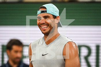 2022-05-19 - Rafael Nadal of Spain smiling during a training session of Roland-Garros 2022, French Open 2022, Grand Slam tennis tournament on May 19, 2022 at the Roland-Garros stadium in Paris, France - ROLAND-GARROS 2022, FRENCH OPEN 2022, GRAND SLAM TENNIS TOURNAMENT - INTERNATIONALS - TENNIS