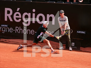 2022-05-18 - Holger Rune (DEN) in action against Adrian Mannarino (FRA) during the round of 16 at the Open Parc Auvergne-Rhone-Alpes Lyon 2022, ATP 250 Tennis tournament on May 18, 2022 at Parc de la Tete d'Or in Lyon, France - OPEN PARC AUVERGNE-RHONE-ALPES LYON 2022, ATP 250 TENNIS TOURNAMENT - INTERNATIONALS - TENNIS