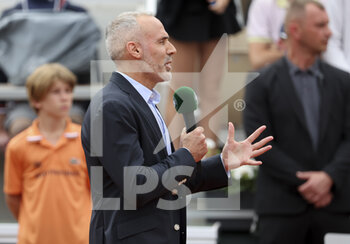 2022-05-22 - Former player Alex Corretja of Spain during an on-court interview on day 1 of the French Open 2022, a tennis Grand Slam tournament on May 22, 2022 at Roland-Garros stadium in Paris, France - ROLAND-GARROS 2022, FRENCH OPEN 2022, GRAND SLAM TENNIS TOURNAMENT - INTERNATIONALS - TENNIS