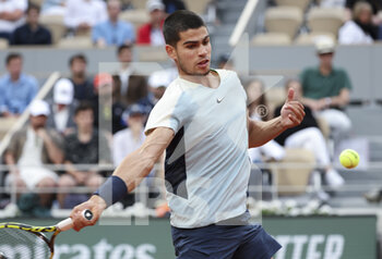 2022-05-22 - Carlos Alcaraz of Spain during day 1 of the French Open 2022, a tennis Grand Slam tournament on May 22, 2022 at Roland-Garros stadium in Paris, France - ROLAND-GARROS 2022, FRENCH OPEN 2022, GRAND SLAM TENNIS TOURNAMENT - INTERNATIONALS - TENNIS