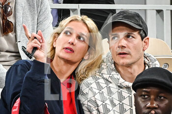 2022-05-23 - Caroline ANGLADE and her husband Nicolas MOREAU during the Day two of Roland-Garros 2022, French Open 2022, Grand Slam tennis tournament on May 23, 2022 at Roland-Garros stadium in Paris, France - ROLAND-GARROS 2022, FRENCH OPEN 2022, GRAND SLAM TENNIS TOURNAMENT - INTERNATIONALS - TENNIS
