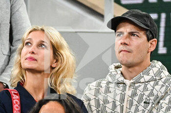 2022-05-23 - Caroline ANGLADE and her husband Nicolas MOREAU during the Day two of Roland-Garros 2022, French Open 2022, Grand Slam tennis tournament on May 23, 2022 at Roland-Garros stadium in Paris, France - ROLAND-GARROS 2022, FRENCH OPEN 2022, GRAND SLAM TENNIS TOURNAMENT - INTERNATIONALS - TENNIS