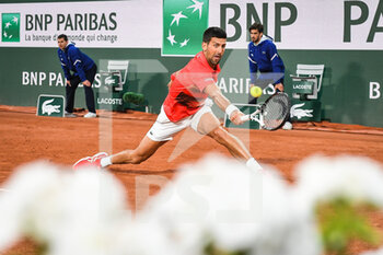 2022-05-23 - Novak DJOKOVIC of Serbia during the Day two of Roland-Garros 2022, French Open 2022, Grand Slam tennis tournament on May 23, 2022 at Roland-Garros stadium in Paris, France - ROLAND-GARROS 2022, FRENCH OPEN 2022, GRAND SLAM TENNIS TOURNAMENT - INTERNATIONALS - TENNIS