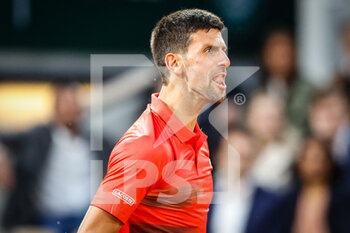 2022-05-23 - Novak DJOKOVIC of Serbia celebrates his point during the Day two of Roland-Garros 2022, French Open 2022, Grand Slam tennis tournament on May 23, 2022 at Roland-Garros stadium in Paris, France - ROLAND-GARROS 2022, FRENCH OPEN 2022, GRAND SLAM TENNIS TOURNAMENT - INTERNATIONALS - TENNIS