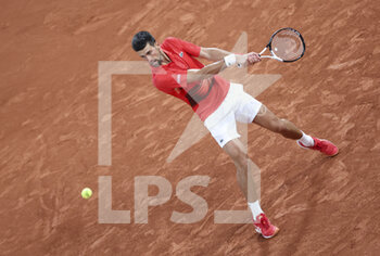 2022-05-23 - Novak Djokovic of Serbia during day 2 of the French Open 2022, a tennis Grand Slam tournament on May 23, 2022 at Roland-Garros stadium in Paris, France - ROLAND-GARROS 2022, FRENCH OPEN 2022, GRAND SLAM TENNIS TOURNAMENT - INTERNATIONALS - TENNIS