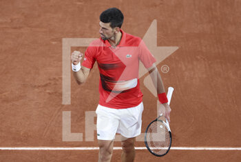 2022-05-23 - Novak Djokovic of Serbia celebrates his victory during day 2 of the French Open 2022, a tennis Grand Slam tournament on May 23, 2022 at Roland-Garros stadium in Paris, France - ROLAND-GARROS 2022, FRENCH OPEN 2022, GRAND SLAM TENNIS TOURNAMENT - INTERNATIONALS - TENNIS