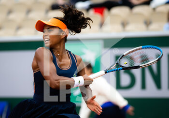 2022-05-24 - Tessah Andrianjafitrimo of France in action against Karolina Pliskova of the Czech Republic during the first round of the Roland-Garros 2022, Grand Slam tennis tournament on May 24, 2022 at Roland-Garros stadium in Paris, France - ROLAND-GARROS 2022, FRENCH OPEN 2022, GRAND SLAM TENNIS TOURNAMENT - INTERNATIONALS - TENNIS