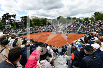 2022-05-24 - General view (illustration, atmosphere with the crowd (audience, public, spectators) on the court 14 during the French Open, Grand Slam tennis tournament on May 24, 2022 at Roland-Garros stadium in Paris, France - ROLAND-GARROS 2022, FRENCH OPEN 2022, GRAND SLAM TENNIS TOURNAMENT - INTERNATIONALS - TENNIS