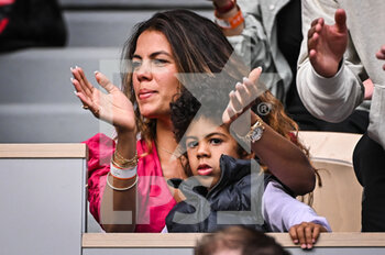 2022-05-24 - Noura EL SHWEKH wife of Jo-Wilfried TSONGA with her son Sugar TSONGA during the Day three of Roland-Garros 2022, French Open 2022, Grand Slam tennis tournament on May 24, 2022 at Roland-Garros stadium in Paris, France - ROLAND-GARROS 2022, FRENCH OPEN 2022, GRAND SLAM TENNIS TOURNAMENT - INTERNATIONALS - TENNIS