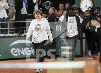 2022-05-24 - Jo-Wilfried Tsonga's parents Didier Tsonga and Evelyne Tsonga during a ceremony celebrating his career after his last tennis match against Casper Ruud of Norway on day 3 of the French Open 2022, a tennis Grand Slam tournament on May 24, 2022 at Roland-Garros stadium in Paris, France - ROLAND-GARROS 2022, FRENCH OPEN 2022, GRAND SLAM TENNIS TOURNAMENT - INTERNATIONALS - TENNIS