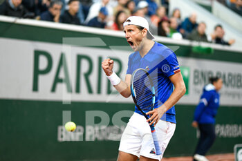 2022-05-24 - Lucas Pouille of France during the French Open, Grand Slam tennis tournament on May 24, 2022 at Roland-Garros stadium in Paris, France - ROLAND-GARROS 2022, FRENCH OPEN 2022, GRAND SLAM TENNIS TOURNAMENT - INTERNATIONALS - TENNIS