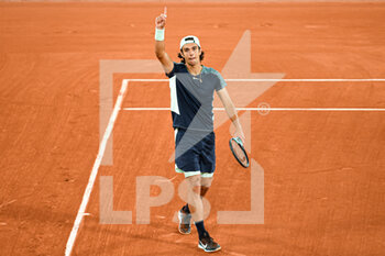 2022-05-24 - Lorenzo Musetti of Italy celebrates during the French Open, Grand Slam tennis tournament on May 24, 2022 at Roland-Garros stadium in Paris, France - ROLAND-GARROS 2022, FRENCH OPEN 2022, GRAND SLAM TENNIS TOURNAMENT - INTERNATIONALS - TENNIS