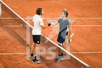 2022-05-24 - Stefanos Tsitsipas of Greece and Lorenzo Musetti of Italy during the French Open, Grand Slam tennis tournament on May 24, 2022 at Roland-Garros stadium in Paris, France - ROLAND-GARROS 2022, FRENCH OPEN 2022, GRAND SLAM TENNIS TOURNAMENT - INTERNATIONALS - TENNIS