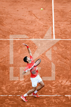 2022-05-25 - Novak Djokovic of Serbia serves during the French Open (Roland-Garros) 2022, Grand Slam tennis tournament on May 25, 2022 at Roland-Garros stadium in Paris, France - ROLAND-GARROS 2022, FRENCH OPEN 2022, GRAND SLAM TENNIS TOURNAMENT - INTERNATIONALS - TENNIS