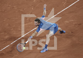 2022-05-25 - Corentin Moutet of France during day 4 of the French Open 2022, a tennis Grand Slam tournament on May 25, 2022 at Roland-Garros stadium in Paris, France - ROLAND-GARROS 2022, FRENCH OPEN 2022, GRAND SLAM TENNIS TOURNAMENT - INTERNATIONALS - TENNIS