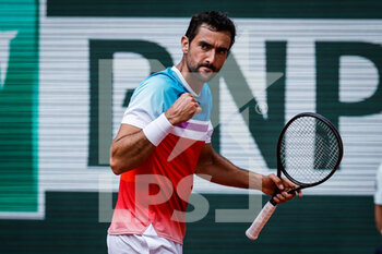 2022-05-28 - Marin CILIC of Croatia celebrates his point during the Day seven of Roland-Garros 2022, French Open 2022, Grand Slam tennis tournament on May 28, 2022 at Roland-Garros stadium in Paris, France - TENNIS - ROLAND GARROS 2022 - WEEK 1 PART 2 - INTERNATIONALS - TENNIS