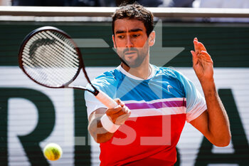 2022-05-28 - Marin CILIC of Croatia during the Day seven of Roland-Garros 2022, French Open 2022, Grand Slam tennis tournament on May 28, 2022 at Roland-Garros stadium in Paris, France - TENNIS - ROLAND GARROS 2022 - WEEK 1 PART 2 - INTERNATIONALS - TENNIS