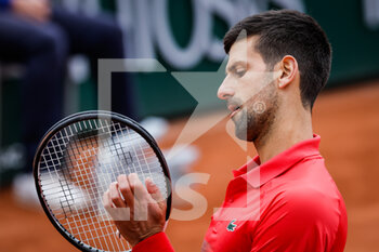 2022-05-29 - Novak DJOKOVIC of Serbia during the Day eight of Roland-Garros 2022, French Open 2022, Grand Slam tennis tournament on May 29, 2022 at Roland-Garros stadium in Paris, France - TENNIS - ROLAND GARROS 2022 - WEEK 2 - INTERNATIONALS - TENNIS