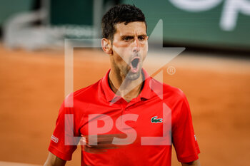 2022-05-31 - Novak DJOKOVIC of Serbia celebrates his point during the Day ten of Roland-Garros 2022, French Open 2022, Grand Slam tennis tournament on May 31, 2022 at Roland-Garros stadium in Paris, France - TENNIS - ROLAND GARROS 2022 - WEEK 2 - INTERNATIONALS - TENNIS