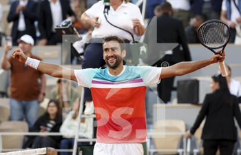 2022-06-01 - Marin Cilic of Croatia celebrates his victory during day 11 of Roland-Garros 2022, French Open 2022, second Grand Slam tennis tournament of the season on June 1, 2022 at Roland-Garros stadium in Paris, France - TENNIS - ROLAND GARROS 2022 - WEEK 2 - INTERNATIONALS - TENNIS