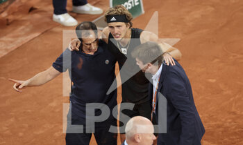 2022-06-03 - Alexander Zverev of Germany suffers a severe injury on his right ankle during his semifinal against Rafael Nadal of Spain on day 13 of Roland-Garros 2022, French Open 2022, second Grand Slam tennis tournament of the season on June 2, 2022 at Roland-Garros stadium in Paris, France - TENNIS - ROLAND GARROS 2022 - WEEK 2 - INTERNATIONALS - TENNIS