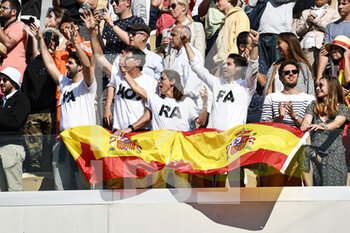 2022-06-05 - Spectators (fans, supporters) show their support for Spain's Rafael Nadal with Spanish flags and "Vamos Rafa" written on their tee-shirt during the French Open final between Rafael Nadal and Casper Ruud, Grand Slam tennis tournament on June 5, 2022 at Roland-Garros stadium in Paris, France - TENNIS - ROLAND GARROS 2022 - WEEK 2 - INTERNATIONALS - TENNIS
