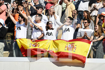 2022-06-05 - Spectators (fans, supporters) show their support for Spain's Rafael Nadal with Spanish flags and "Vamos Rafa" written on their tee-shirt during the French Open final between Rafael Nadal and Casper Ruud, Grand Slam tennis tournament on June 5, 2022 at Roland-Garros stadium in Paris, France - TENNIS - ROLAND GARROS 2022 - WEEK 2 - INTERNATIONALS - TENNIS