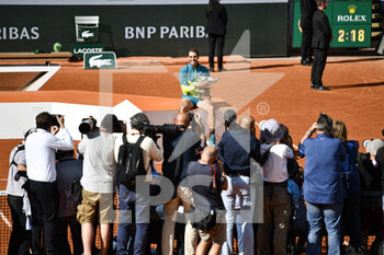 2022-06-05 - Rafael "Rafa" Nadal of Spain receives The Musketeers' Trophy ("La Coupe des Mousquetaires") after the French Open final against Casper Ruud and poses for the press sports photographers, Grand Slam tennis tournament on June 5, 2022 at Roland-Garros stadium in Paris, France - TENNIS - ROLAND GARROS 2022 - WEEK 2 - INTERNATIONALS - TENNIS