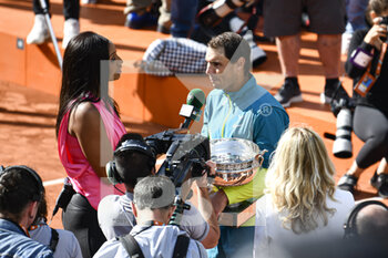 2022-06-05 - Rafael "Rafa" Nadal of Spain is interviewed by a TV journalist after the French Open final against Casper Ruud, Grand Slam tennis tournament on June 5, 2022 at Roland-Garros stadium in Paris, France - TENNIS - ROLAND GARROS 2022 - WEEK 2 - INTERNATIONALS - TENNIS