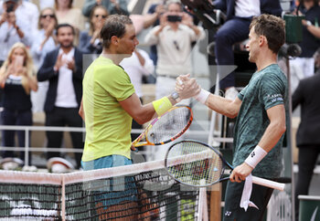 2022-06-05 - Rafael Nadal of Spain shakes hands with Casper Ruud of Norway after his victory in the men's final during day 15 of Roland-Garros 2022, French Open 2022, second Grand Slam tennis tournament of the season on June 5, 2022 at Roland-Garros stadium in Paris, France - TENNIS - ROLAND GARROS 2022 - WEEK 2 - INTERNATIONALS - TENNIS