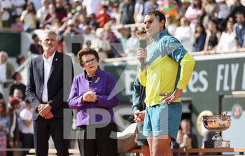 2022-06-05 - Winner Rafael Nadal of Spain, left Gilles Moretton, President of the French Tennis Federation, Billie Jean King during the trophy ceremony of the men's final during day 15 of Roland-Garros 2022, French Open 2022, second Grand Slam tennis tournament of the season on June 5, 2022 at Roland-Garros stadium in Paris, France - TENNIS - ROLAND GARROS 2022 - WEEK 2 - INTERNATIONALS - TENNIS