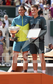 2022-06-05 - Winner Rafael Nadal of Spain, finalist Casper Ruud of Norway during the trophy ceremony of the men's final during day 15 of Roland-Garros 2022, French Open 2022, second Grand Slam tennis tournament of the season on June 5, 2022 at Roland-Garros stadium in Paris, France - TENNIS - ROLAND GARROS 2022 - WEEK 2 - INTERNATIONALS - TENNIS