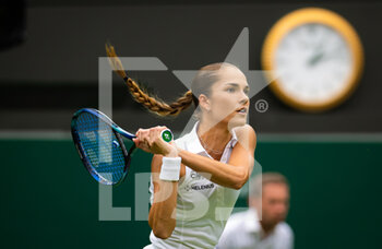 2022-06-27 - Mirjam Bjorklund of Sweden in action against Ons Jabeur of Tunisia during the first round of the 2022 Wimbledon Championships, Grand Slam tennis tournament on June 27, 2022 at All England Lawn Tennis Club in Wimbledon near London, England - TENNIS - WIMBLEDON 2022 - INTERNATIONALS - TENNIS