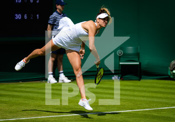 2022-06-27 - Anna Bondar of Hungary in action against Anhelina Kalinina of Ukraine during the first round of the 2022 Wimbledon Championships, Grand Slam tennis tournament on June 27, 2022 at All England Lawn Tennis Club in Wimbledon near London, England - TENNIS - WIMBLEDON 2022 - INTERNATIONALS - TENNIS