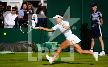 2022-06-27 - Mai Hontama of Japan in action against Clara Tauson of Denmark during the first round of the 2022 Wimbledon Championships, Grand Slam tennis tournament on June 27, 2022 at All England Lawn Tennis Club in Wimbledon near London, England - TENNIS - WIMBLEDON 2022 - INTERNATIONALS - TENNIS