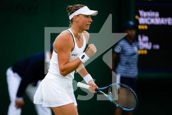 2022-06-28 - Yanina Wickmayer of Belgium in action against Zhu Lin of China during the first round of the 2022 Wimbledon Championships, Grand Slam tennis tournament on June 28, 2022 at All England Lawn Tennis Club in Wimbledon near London, England - TENNIS - WIMBLEDON 2022 - INTERNATIONALS - TENNIS