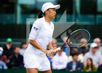 2022-06-29 - Shuai Zhang of China in action against Marta Kostyuk of Ukraine during the second round of the 2022 Wimbledon Championships, Grand Slam tennis tournament on June 29, 2022 at All England Lawn Tennis Club in Wimbledon near London, England - TENNIS - WIMBLEDON 2022 - INTERNATIONALS - TENNIS