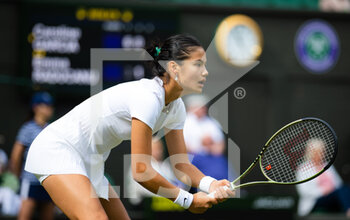 2022-06-29 - Emma Raducanu of Great Britain in action against Caroline Garcia of France during the second round of the 2022 Wimbledon Championships, Grand Slam tennis tournament on June 29, 2022 at All England Lawn Tennis Club in Wimbledon near London, England - TENNIS - WIMBLEDON 2022 - INTERNATIONALS - TENNIS
