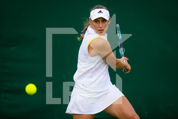 2022-06-29 - Kaja Juvan of Slovenia in action against Dalma Galfi of Hungary during the second round of the 2022 Wimbledon Championships, Grand Slam tennis tournament on June 29, 2022 at All England Lawn Tennis Club in Wimbledon near London, England - TENNIS - WIMBLEDON 2022 - INTERNATIONALS - TENNIS