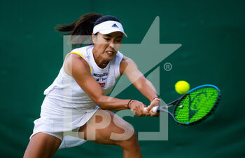 2022-06-29 - Qiang Wang of China in action against Heather Watson of Great Britain during the second round of the 2022 Wimbledon Championships, Grand Slam tennis tournament on June 29, 2022 at All England Lawn Tennis Club in Wimbledon near London, England - TENNIS - WIMBLEDON 2022 - INTERNATIONALS - TENNIS