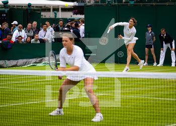 2022-06-30 - Jule Niemeier of Germany & Andrea Petkovic of Germany in action during the first round of doubles at the 2022 Wimbledon Championships, Grand Slam tennis tournament on June 30, 2022 at All England Lawn Tennis Club in Wimbledon near London, England - TENNIS - WIMBLEDON 2022 - INTERNATIONALS - TENNIS