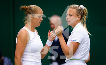 2022-06-30 - Anett Kontaveit of Estonia & Shelby Rogers of the United States in action during the first round of doubles at the 2022 Wimbledon Championships, Grand Slam tennis tournament on June 30, 2022 at All England Lawn Tennis Club in Wimbledon near London, England - TENNIS - WIMBLEDON 2022 - INTERNATIONALS - TENNIS