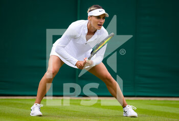 2022-06-30 - Ana Bogdan of Romania in action against Petra Kvitova of the Czech Republic during the second round of the 2022 Wimbledon Championships, Grand Slam tennis tournament on June 30, 2022 at All England Lawn Tennis Club in Wimbledon near London, England - TENNIS - WIMBLEDON 2022 - INTERNATIONALS - TENNIS