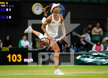 2022-06-30 - Mihaela Buzarnescu of Romania in action against Coco Gauff of the United States during the second round of the 2022 Wimbledon Championships, Grand Slam tennis tournament on June 30, 2022 at All England Lawn Tennis Club in Wimbledon near London, England - TENNIS - WIMBLEDON 2022 - INTERNATIONALS - TENNIS
