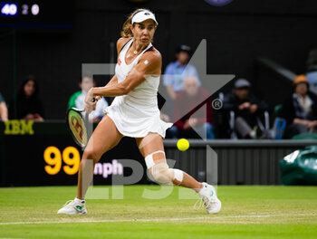 2022-06-30 - Mihaela Buzarnescu of Romania in action against Coco Gauff of the United States during the second round of the 2022 Wimbledon Championships, Grand Slam tennis tournament on June 30, 2022 at All England Lawn Tennis Club in Wimbledon near London, England - TENNIS - WIMBLEDON 2022 - INTERNATIONALS - TENNIS