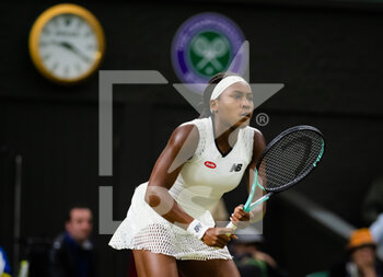 2022-06-30 - Coco Gauff of the United States in action against Mihaela Buzarnescu of Romania during the second round of the 2022 Wimbledon Championships, Grand Slam tennis tournament on June 30, 2022 at All England Lawn Tennis Club in Wimbledon near London, England - TENNIS - WIMBLEDON 2022 - INTERNATIONALS - TENNIS