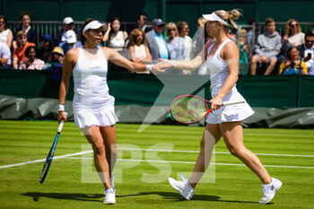 2022-07-01 - Giuliana Olmos of Mexico & Gabriela Dabrowski of Canada in action during the second round of doubles at the 2022 Wimbledon Championships, Grand Slam tennis tournament on July 1, 2022 at All England Lawn Tennis Club in Wimbledon near London, England - TENNIS - WIMBLEDON 2022 - INTERNATIONALS - TENNIS