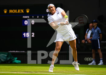 2022-07-01 - Ons Jabeur of Tunisia in action against Diane Parry of France during the third round of the 2022 Wimbledon Championships, Grand Slam tennis tournament on July 1, 2022 at All England Lawn Tennis Club in Wimbledon near London, England - TENNIS - WIMBLEDON 2022 - INTERNATIONALS - TENNIS