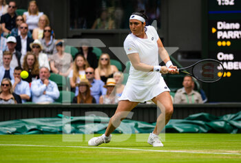 2022-07-01 - Ons Jabeur of Tunisia in action against Diane Parry of France during the third round of the 2022 Wimbledon Championships, Grand Slam tennis tournament on July 1, 2022 at All England Lawn Tennis Club in Wimbledon near London, England - TENNIS - WIMBLEDON 2022 - INTERNATIONALS - TENNIS